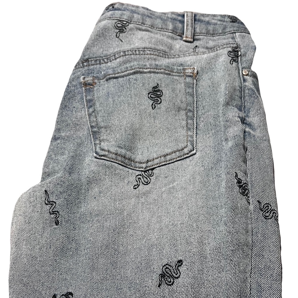 snake print light blue jeans